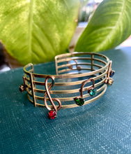 Load image into Gallery viewer, 1940s Carper Co Music Staff Bracelet in 12k Goldfill with Multicolor Rhinestone Music Notes
