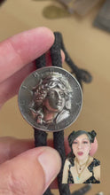 Load and play video in Gallery viewer, Bolo Tie with 1964 Silver Pop-Out Coin, Turquoise and Handmade Leaves &amp; Flower in Solid Sterling Silver
